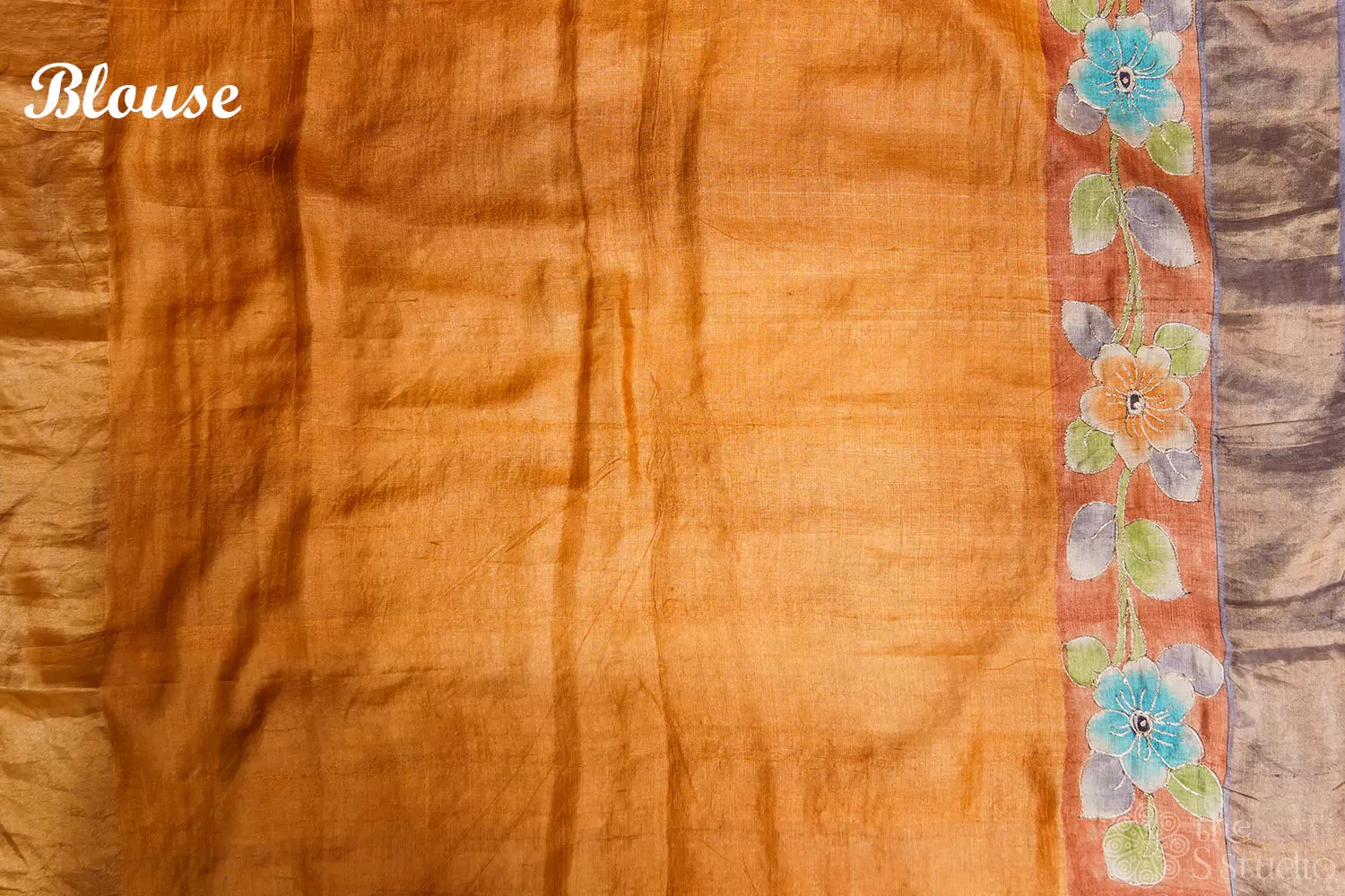 Brown tussar silk saree with floral prints and zari border