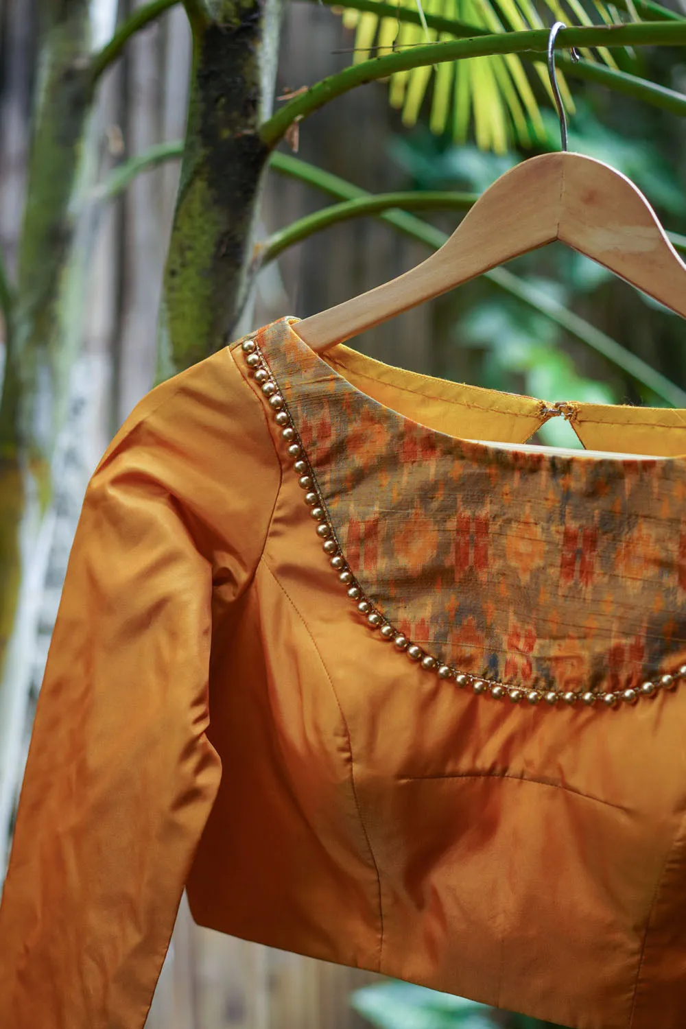 Mustard silk boatneck  blouse with pure rawsilk ikkat yoke