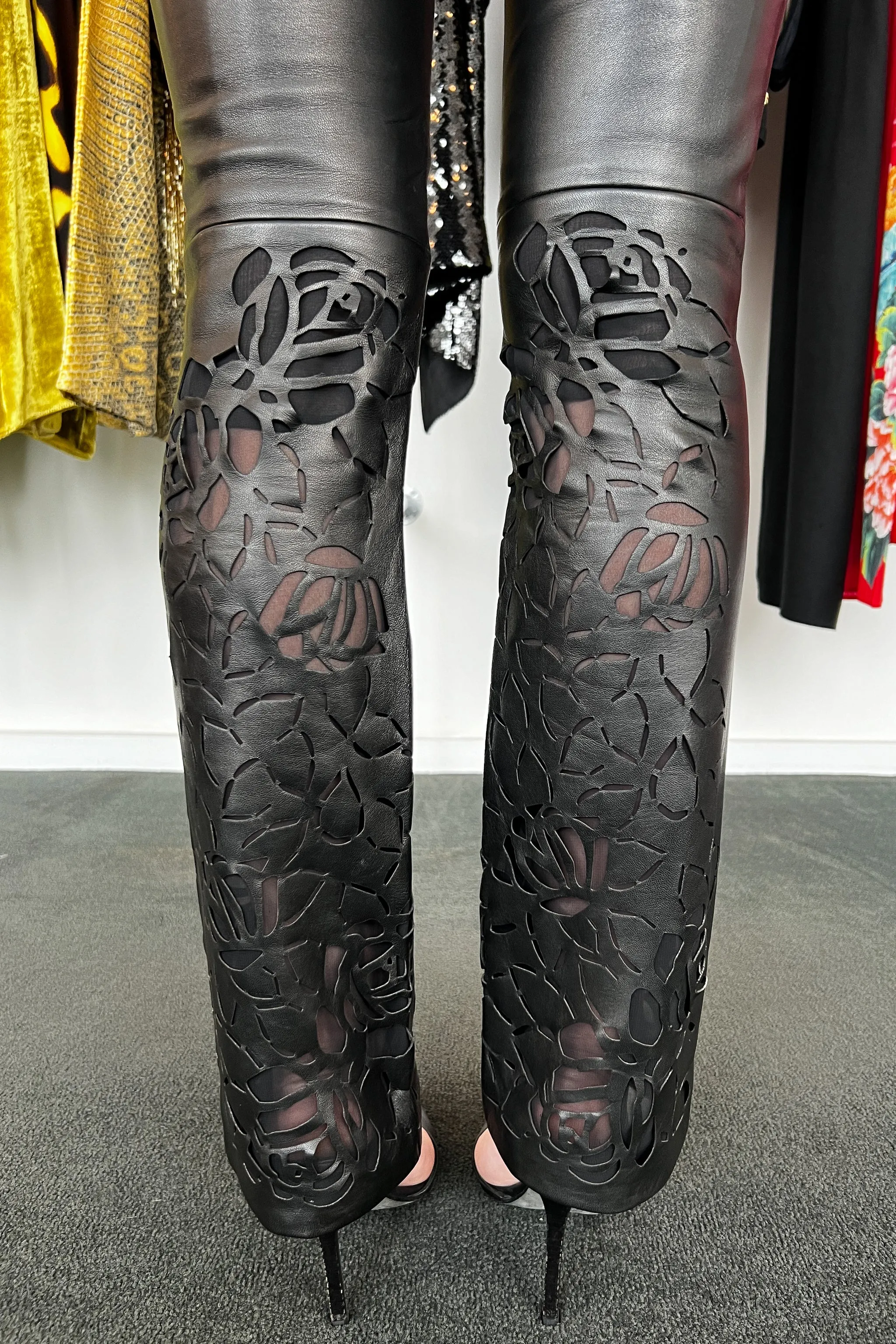 VERSACE BLACK LEATHER PANTS WITH FLORAL LASER CUTOUTS